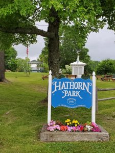 Hathorn Park sign with the Cupola and the Gazebo in background.